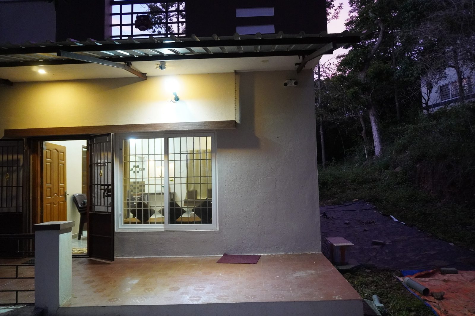 Villa exterior amid the silver oaks